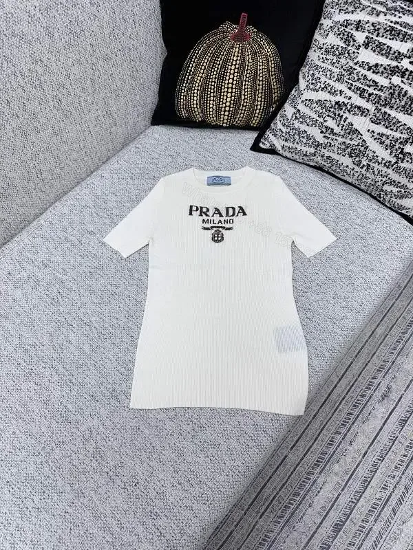 View 1 of Minimalist Ivory Knit Tee with Prominent Branding