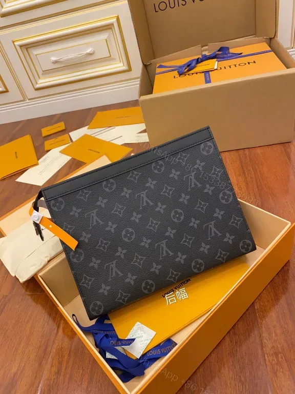 View 1 of Monogram Canvas Pouch: Modern Luxury, All-Day Confidence