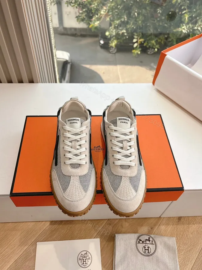 View 1 of Hermes Women White Suede And Mesh Sneakers