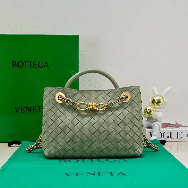 View 1 of Woven Leather Mini Bag with Gold Chain â€“ Everyday Luxury