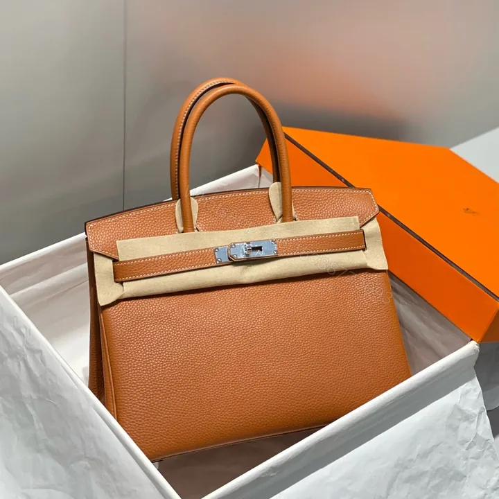 View 1 of HN 30 BROWN TOGO LEATHER SILVER HARDWARE