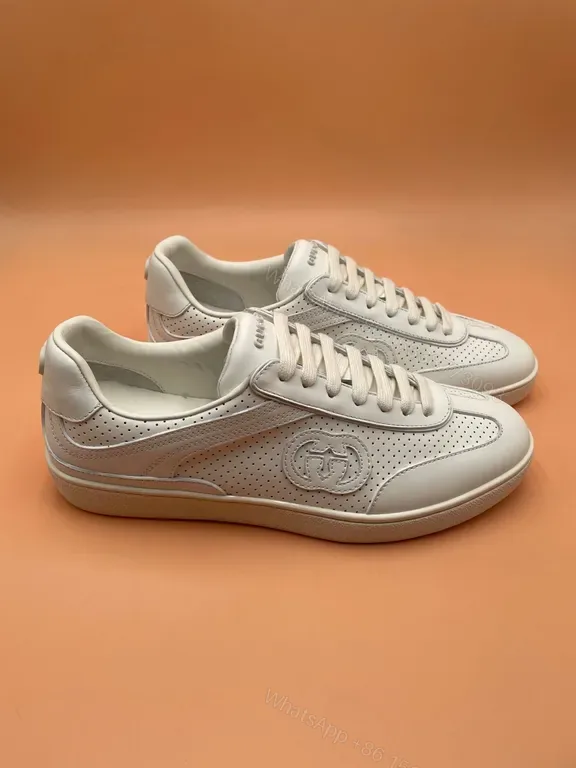 View 1 of Minimalist Leather Sneakers in Off-White â€“ Perforated Luxury Sneakers