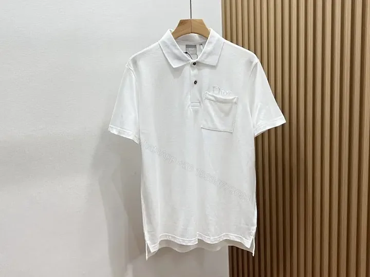 View 1 of Minimalist White Cotton Polo with Subtle Detailing
