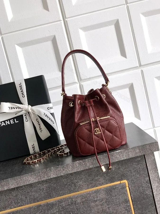 View 1 of Burgundy Quilted Mini Bag with Gold Hardware