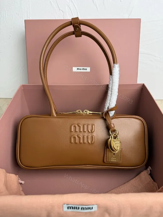 View 1 of Tan Leather Structured Crossbody: Modern Craftsmanship