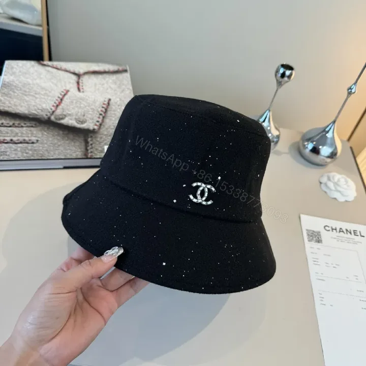 View 1 of Black Speckle Bucket Hat with Crystal Logo - Luxury Style