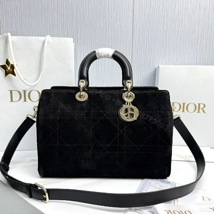 View 1 of Velvet Black Structured Bag: Gold Hardware, Quilted Charm