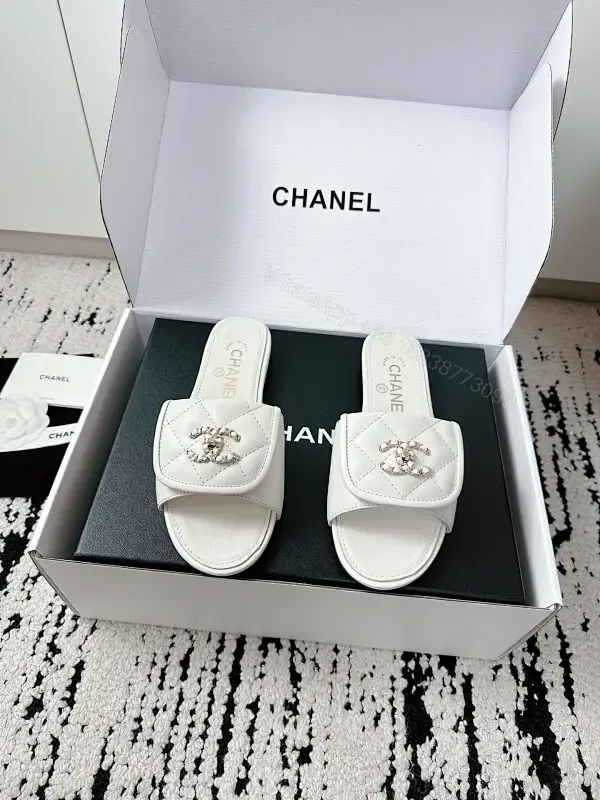 View 1 of White Leather Quilted Slides with Crystal Accent — All-Day Comfort