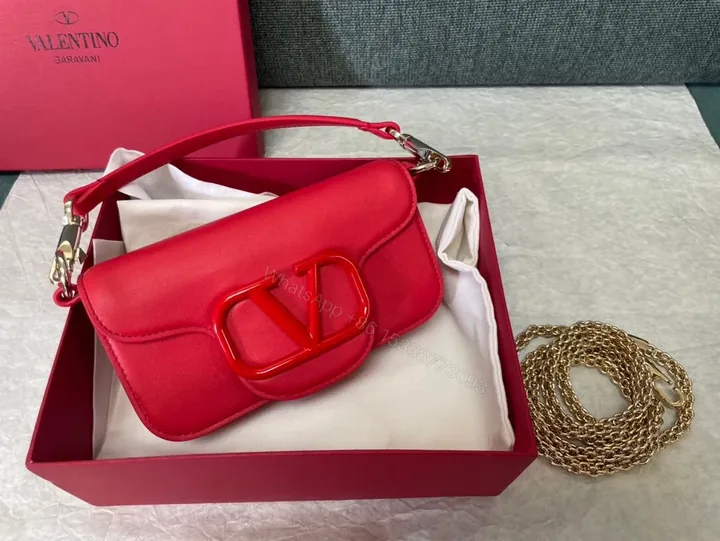 View 1 of Bold Red Leather Bag with Signature V Buckle - Luxury Crossbody
