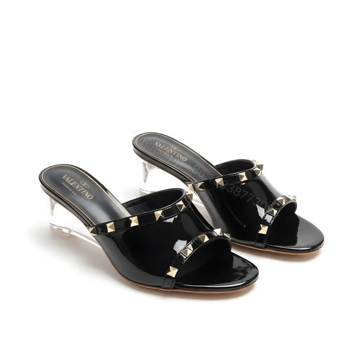 View 1 of Valentino Garavani Rockstud Skin Heeled Sandals Black