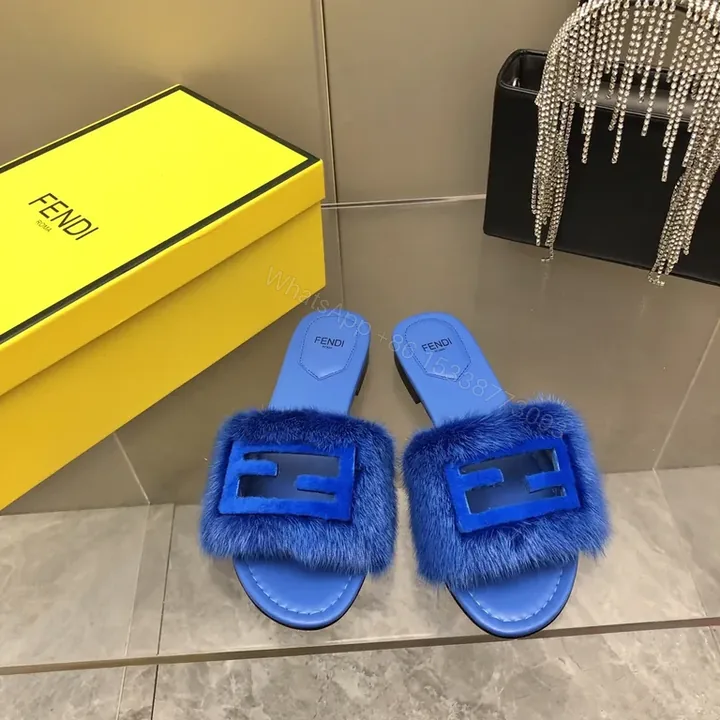 View 1 of Blue Fur-Trim Slip-On Sandals with Fendi-Inspired Hardware