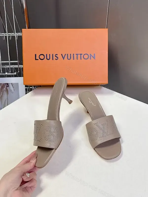 View 1 of Minimalist Taupe Leather Slides with Rhinestone Logo Embellishment