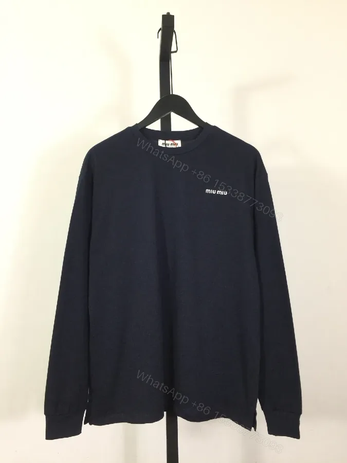 View 1 of Minimalist Navy Cotton Crewneck Sweatshirt with Subtle Logo