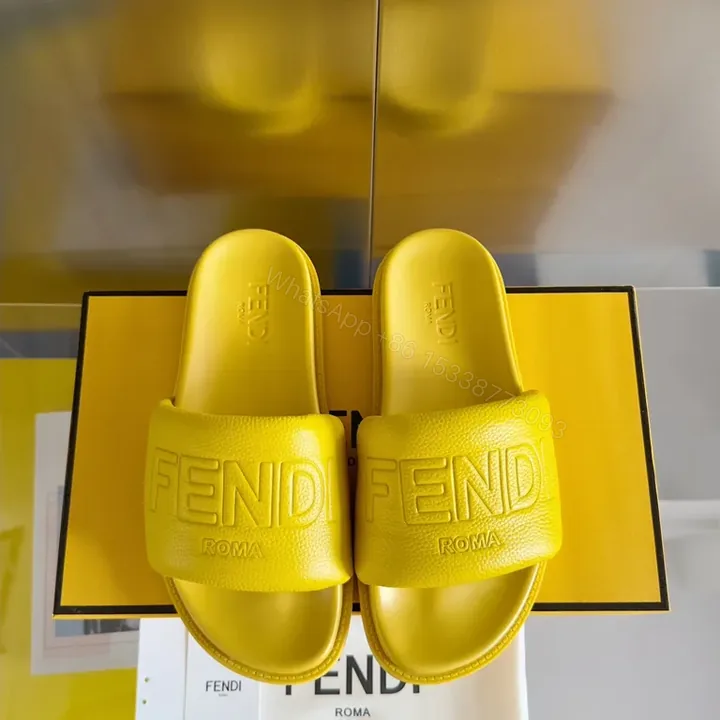 View 1 of Yellow Leather Slip-On Sandals by Fendi Roma + Contoured Comfort