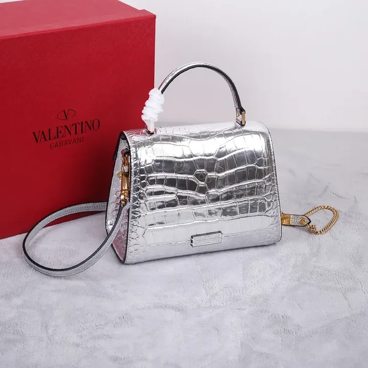 View 1 of Gleaming Croc-Embossed Silver Handbag: Luxe Crossbody Bag
