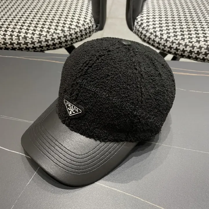 View 1 of Textured Luxury Cap: Fleece Crown, Leather-Like Brim, Minimal Prada Flair