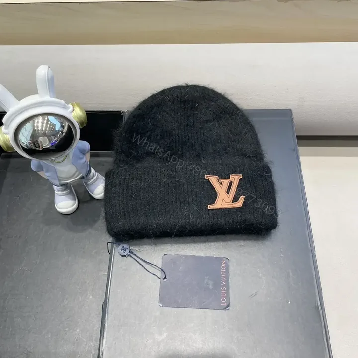 View 1 of Cozy Knit Beanie with Rose-Gold LV Emblem