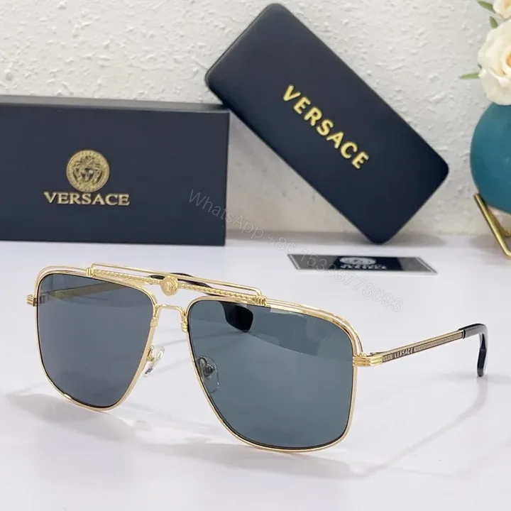 View 1 of Gilded Medusa: Gold-Tone Sunglasses with Crest