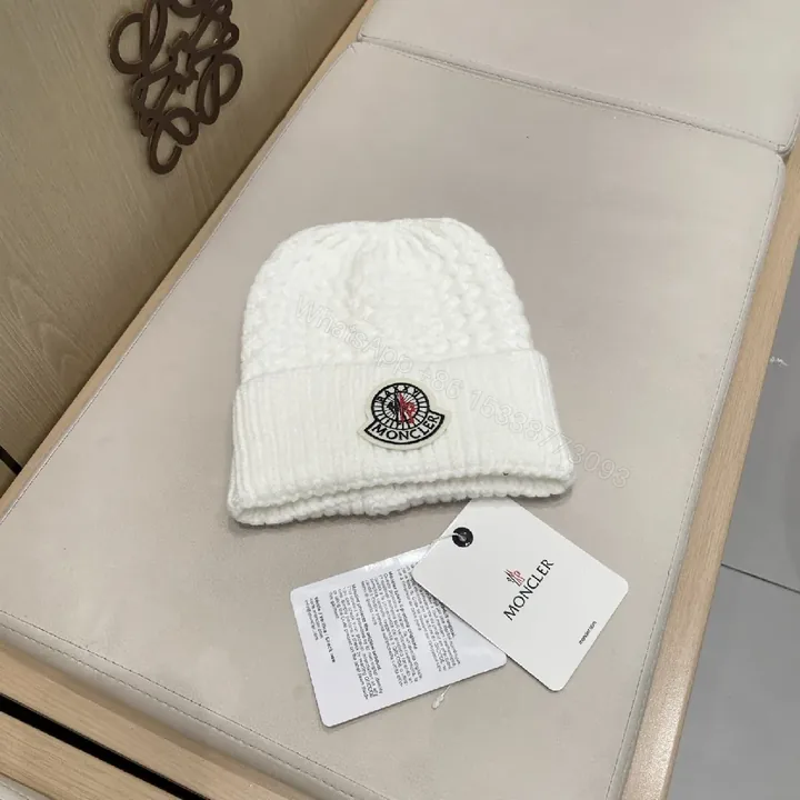 View 1 of White Knit Beanie with Premium Comfort Knit Style and Moncler Patch