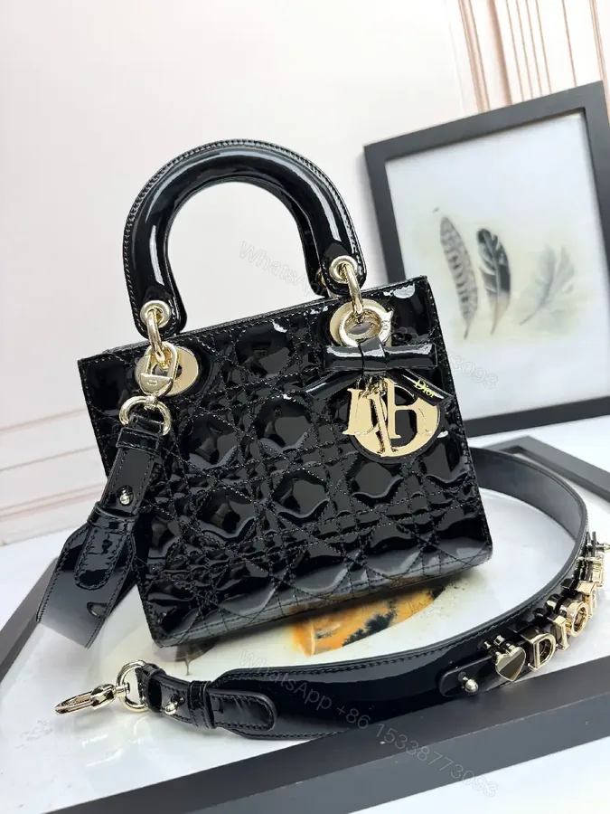 View 1 of Quilted Patent Mini Bag with Gold-Tone Charms, Black