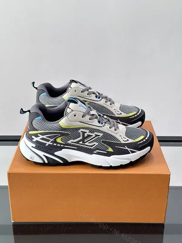 View 1 of Gray/Black Mesh Leather Sneaker with LV Accents, Sporty Chunky Style