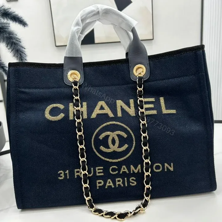 View 1 of CHANEL DEAUVILLE LARGE 38 TOTE BAG IN BLACK CANVAS WITH GOLD EMBROIDERED LOGO