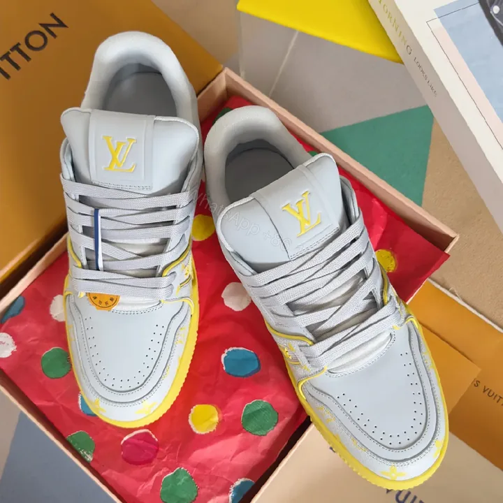 View 1 of Bold Leather High-Top Sneakers with LV Accents