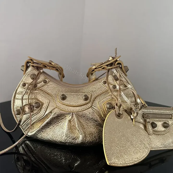 View 1 of 高仿Balenciaga*LeCagole系列餃子包金色XS