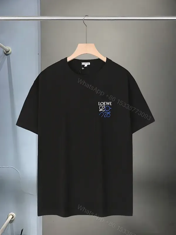 View 1 of Black Cotton Tee — Premium Comfort, Subtle Signature Detail, Modern Fit