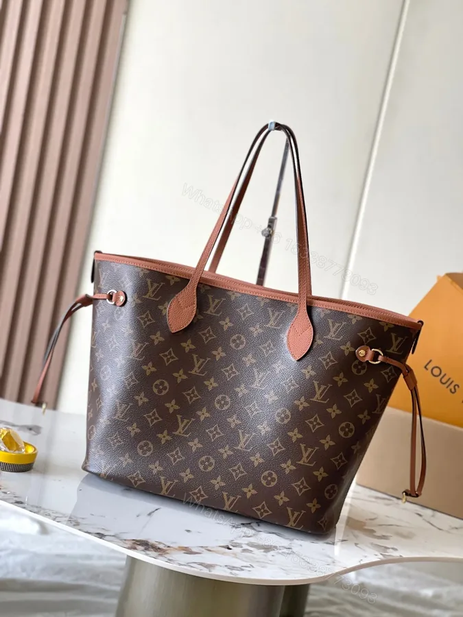View 1 of LV NEVERFULL INSIDE OUT MM IN BROWN MONOGRAM CANVAS AND CALFSKIN TRIM