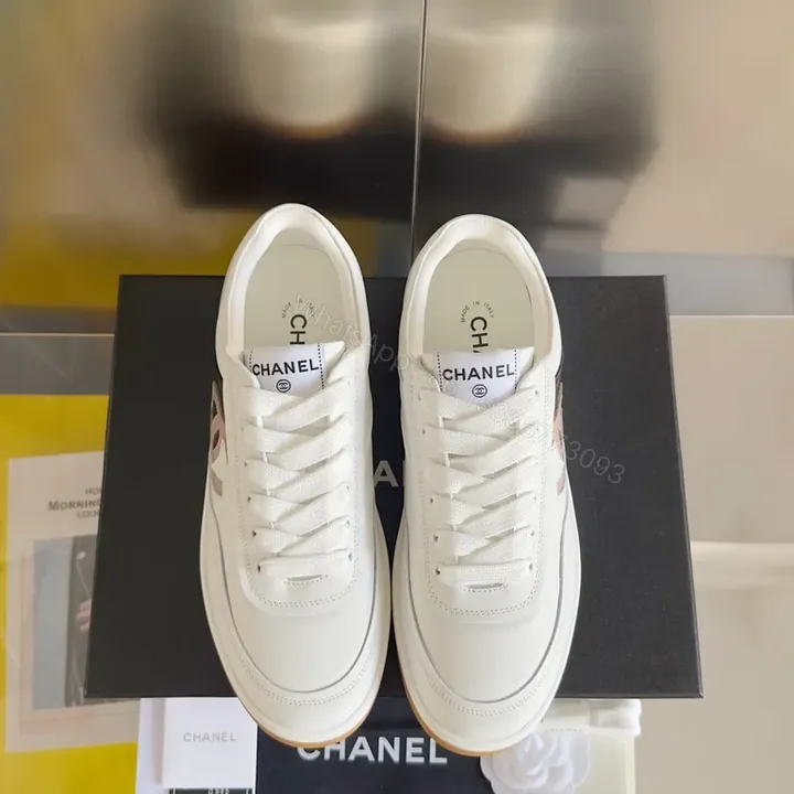 View 1 of White Leather Luxury Sneakers: Chanel-Inspired, All-Day Comfort