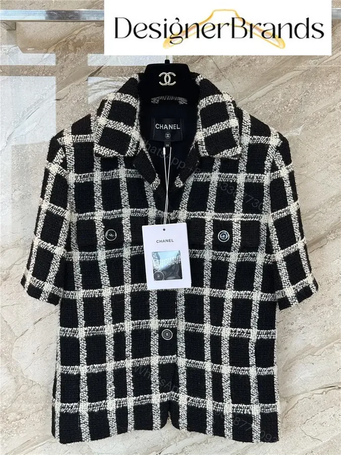View 1 of Chanel Classic Black and White Plaid Tweed Jacket