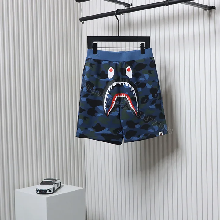 View 1 of Bape Camo Shark Shorts Deep Blue