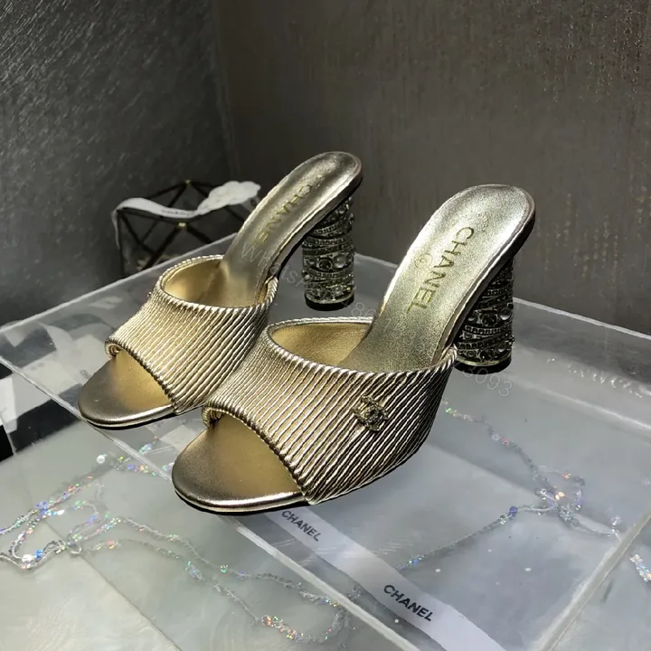 View 1 of Glam Metallic Slip-Ons: Sculpted Heel Luxury Mules