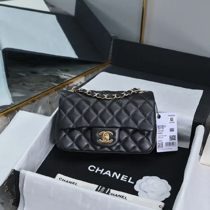 View 1 of Compact Black Quilted Leather Shoulder Bag with Chain