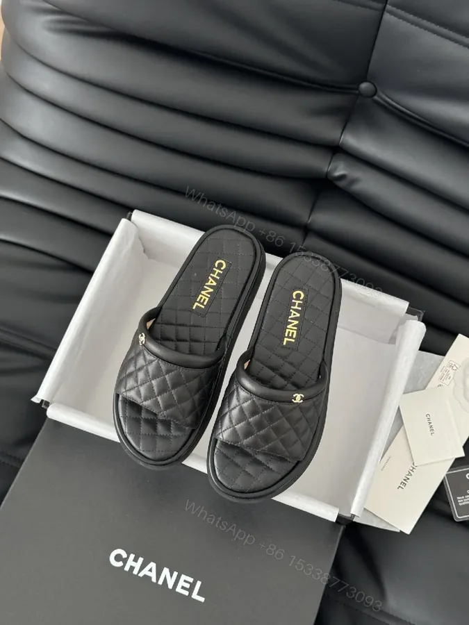 View 1 of Quilted Black Leather Slip-Ons with Gold Hardware – Ultra-Luxe Comfort