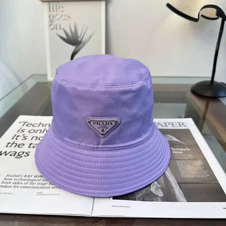 View 1 of Pastel Lavender Nylon Bucket Hat with Prada-Inspired Detail