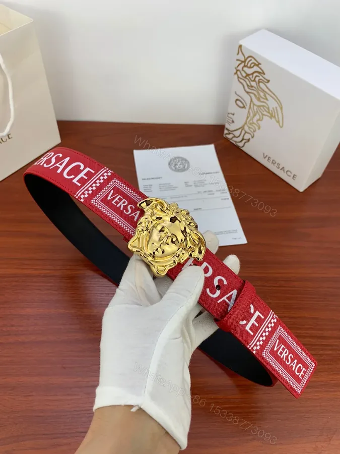 View 1 of Red Leather Belt with Gold Medusa Buckle, Luxe Versatile Accessory