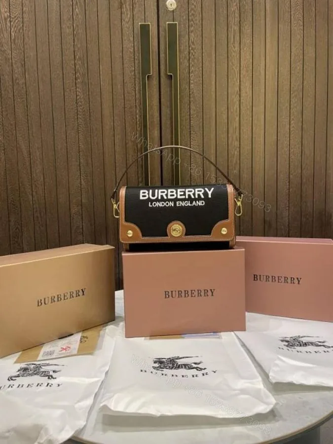 View 1 of First Copy Burberry Black Mini Top Handle Bag With Logo Print And Premium Finish