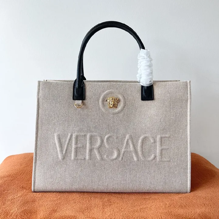 View 1 of Textured Canvas Tote: Bold, Structured Everyday Luxury