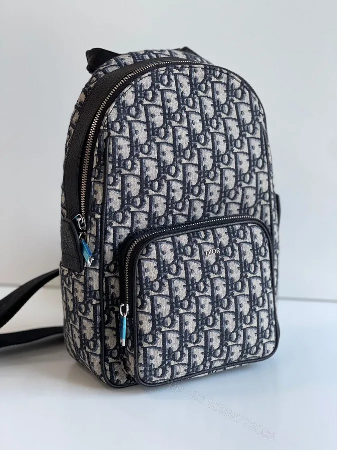 View 1 of DIOR MEN Oblique Mini Rider Backpack