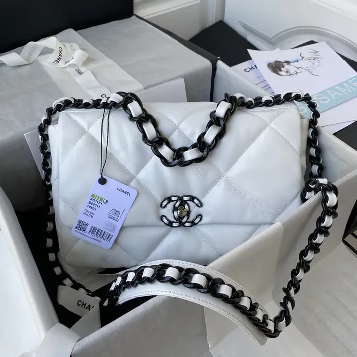 View 1 of Chic Quilted Leather Tote with Signature Chain Details