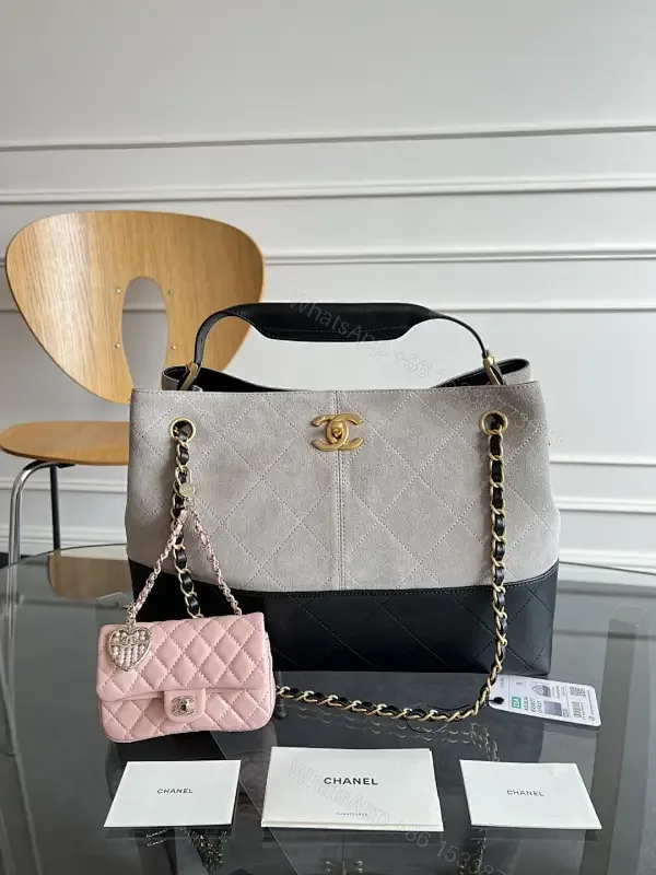 View 1 of Two-Tone Quilted Tote: Convertible Chain Handle, Subtle Glam