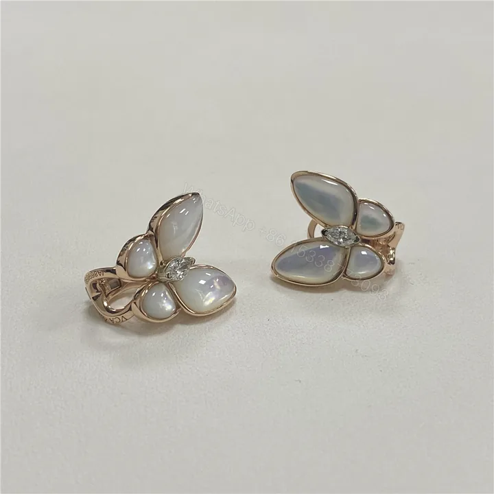 View 1 of Van Cleef & Arpels Two Butterfly Mother Of Pearl And Diamond Earrings VCARO8FN00