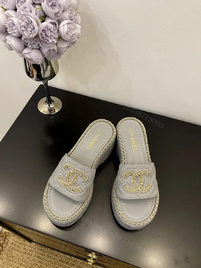 View 1 of Grey Leather Slip-On Sandals with Gold Chain Logo