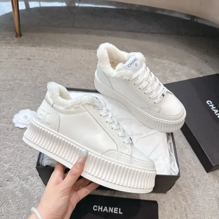 View 1 of White Leather Platform Sneakers with Plush Shearling
