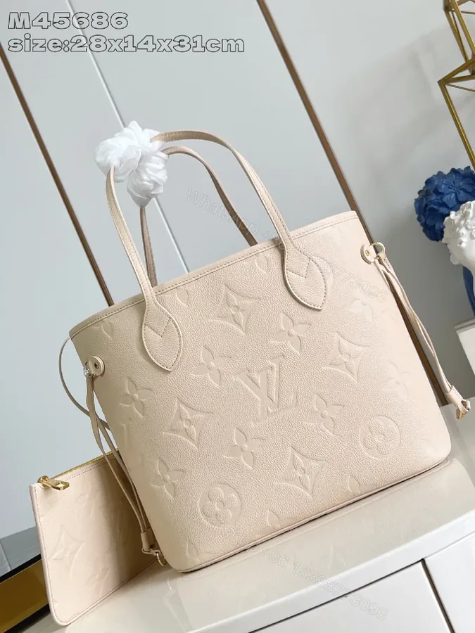 View 1 of Structured Tote: Monogram Texture, Pebbled Leather, Everyday Luxury