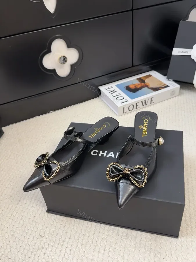 View 1 of Chic Black Patent Mule with Chain Bow Detail, Luxe Style