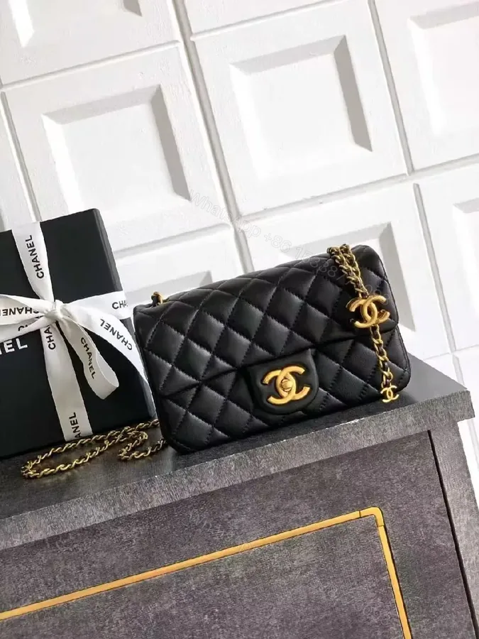 View 1 of Quilted Crossbody: Luxe Black Leather, Chic, Compact Essential
