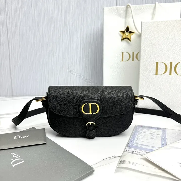 View 1 of Compact Black Leather Crossbody with Gold CD Closure